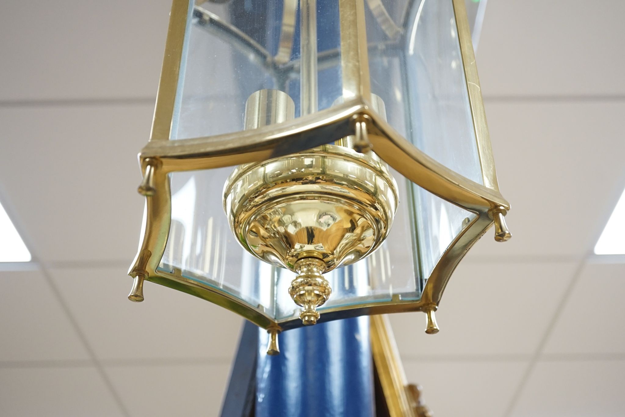 A brass hanging hall lantern